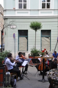 Musicians playing in a square our hostel