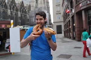 Eating oversized pretzels and sausage